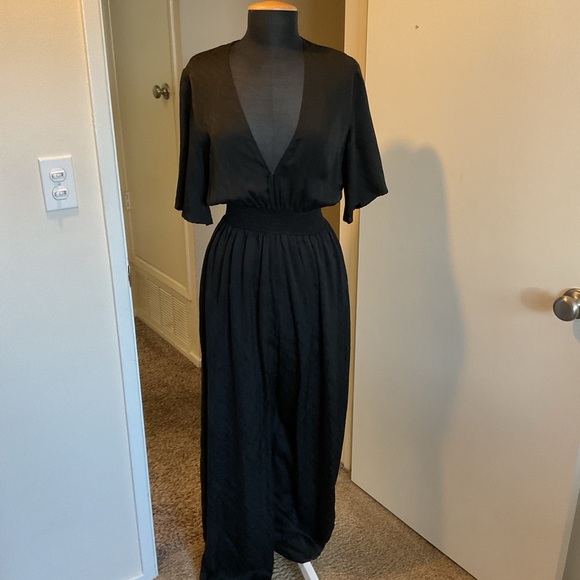 21. Reformation Black Jumpsuit with Sophisticated Wide-Leg Style Size 10 - Picture 8 of 13